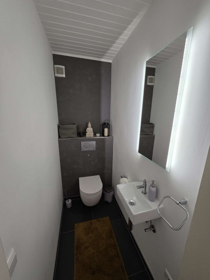 Gäste WC - Moderne 3 Zimmerwohnung mit 2 Balkonen und Garage, in Düren – Gürzenich zu verkaufen